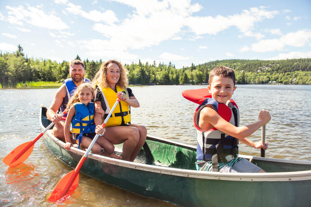 Family in a kayak near Lake Logan Marina in Ohio